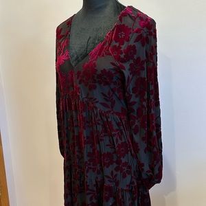 Black dress with deep burgundy velvet accent
